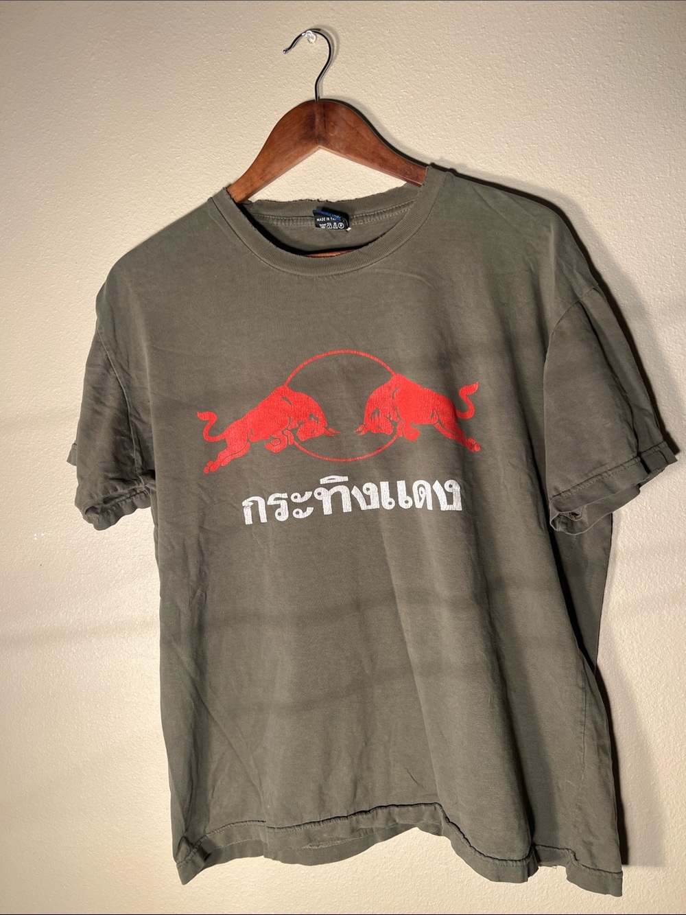 Krating Daeng Olive Green Short-Sleeve Tee with Red Graphic